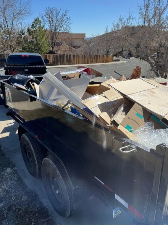 Dump trailer full of cardboard and household junk from a cleanout in Delaware, DE